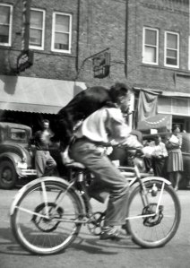 Dad in the town parade with his dog